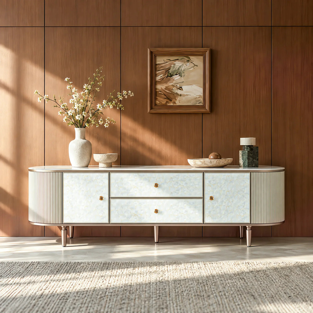 Pearl-front TV console with a marble-look top in a warm living room