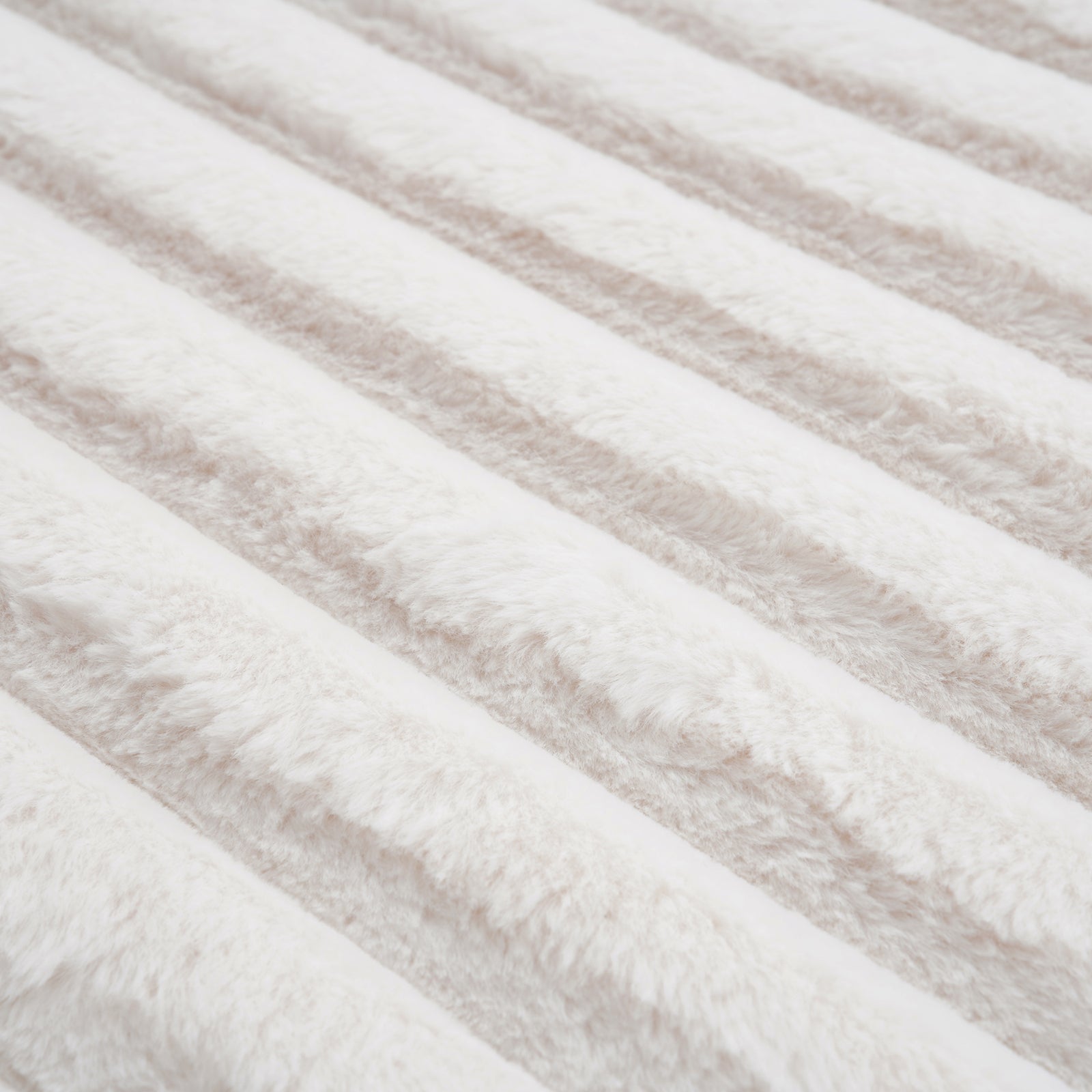 The deep, ribbed faux-fur pile up close.