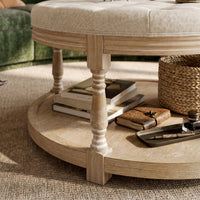 Upholstered Round Coffee Table with Open Shelf Base