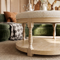 Upholstered Round Coffee Table with Open Shelf Base