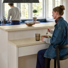 Modern Kitchen Island with Built-In Power Outlet and Dual-Level Tabletop